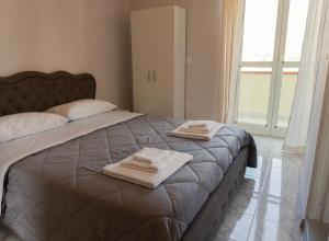 Postel nebo postele na pokoji v ubytování B&B SARDES