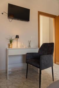 TV a/nebo společenská místnost v ubytování B&B SARDES