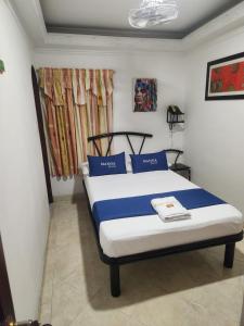 Katil atau katil-katil dalam bilik di Hotel Manoa