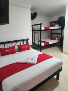 Katil atau katil-katil dalam bilik di Hotel Manoa