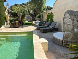 Πισίνα στο ή κοντά στο Logement cosy avec piscine ,parking et jardin
