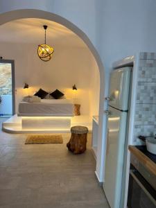 En eller flere senge i et værelse på Provenzo Luxury Apartments and Suites