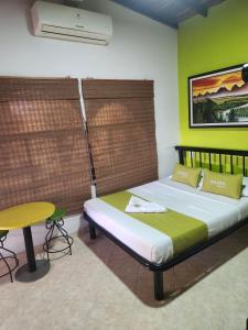 Katil atau katil-katil dalam bilik di Hotel Manoa