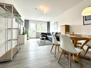 Гостиная зона в Moderne Apartments im Zentrum - Hermannliving