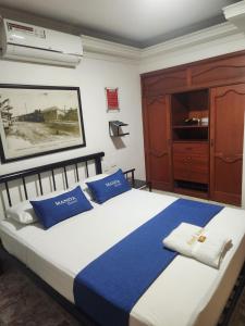 Katil atau katil-katil dalam bilik di Hotel Manoa