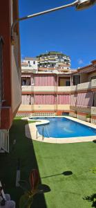 The swimming pool at or close to APTO TANEZ TORREMOLINOS, a