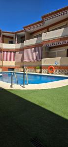 The swimming pool at or close to APTO TANEZ TORREMOLINOS, a