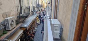 a group of people walking down a city street at Maison Michela Sorrento in Sorrento