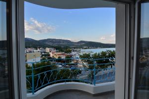 a view of a city from a window at Blue Lagoon 1 in Kavala