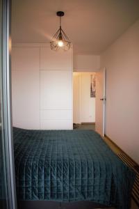 Cama ou camas em um quarto em Green Freeda