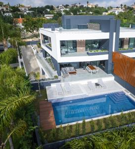 an aerial view of a house with a swimming pool at Buganvilia - Luxury villa - private pool by HD in Almancil