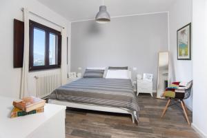 Letto o letti in una camera di B&B Vignicella