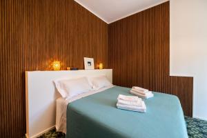 Postel nebo postele na pokoji v ubytování B&B Lu Cuccuviu a Mare