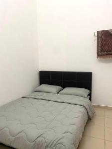 Cama o camas de una habitación en Homestay Taman Melati Jerantut
