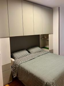 En eller flere senge i et værelse på Gubbiotti Appartamento Bilocale