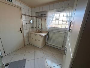 Koupelna v ubytování Vakantiehuis Santorini + 11 fotografií