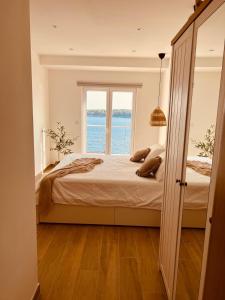 Postel nebo postele na pokoji v ubytování BohoSol House + 24 fotografií