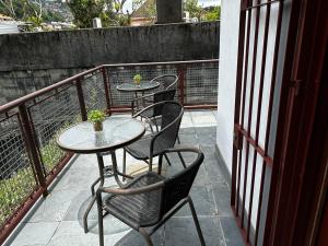 A balcony or terrace at Village Hostel
