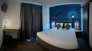 Postel nebo postele na pokoji v ubytování rev'hotel + 23 fotografií