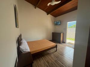 Postel nebo postele na pokoji v ubytování Bapizu Suítes - Ubatuba + 30 fotografií