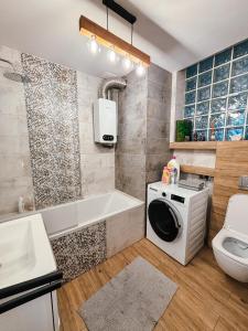 Koupelna v ubytování Apartament Curie + 4 fotografie