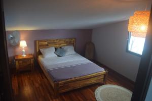 Postel nebo postele na pokoji v ubytování Superbe villa saint leu piscine et spa vue Océan + 25 fotografií