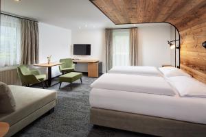 Voodi või voodid majutusasutuse Hotel Gasthof Siggen toas