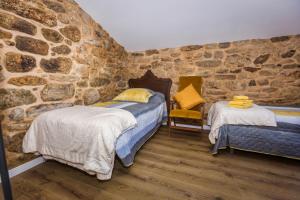 Ένα ή περισσότερα κρεβάτια σε δωμάτιο στο Casa Lela Dumbria