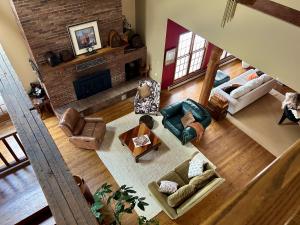an overhead view of a living room with a fireplace at Warner-Concord Farms Bed & Breakfast in Geneva