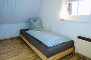 Postel nebo postele na pokoji v ubytování Ferienhaus Prerow