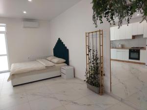 Кровать или кровати в номере DreamTown Однокімнатна біля вокзалу
