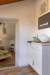 Posteľ alebo postele v izbe v ubytovaní HOMESTAY rooftop