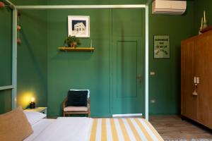 Posteľ alebo postele v izbe v ubytovaní HOMESTAY rooftop