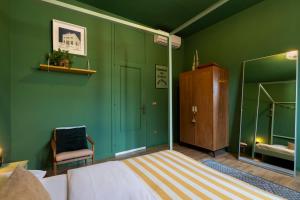 Posteľ alebo postele v izbe v ubytovaní HOMESTAY rooftop