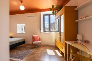 Posteľ alebo postele v izbe v ubytovaní HOMESTAY rooftop