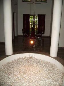 a chandelier in the middle of a room at 4 Bedroom House@Kottayam TownA/C 812983!5682 in Kottayam