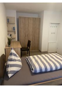 Postel nebo postele na pokoji v ubytování Kegelspiel Apartments