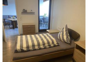 Postel nebo postele na pokoji v ubytování Kegelspiel Apartments