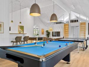 a billiard room with a pool table in it at Holiday home Henne VI in Henne Strand