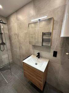 Ванная комната в Ferienwohnung Nähe Redbullring