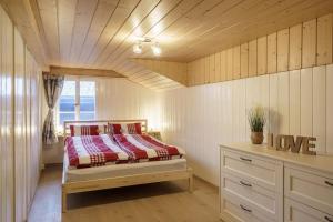 Katil atau katil-katil dalam bilik di 8 Zimmer Haus am schönen Brienzersee