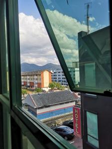 a view of a city from a window at Y.U.A.N in Kluang