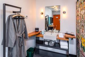 a bathroom with a sink and a mirror at The FINCH in Walla Walla