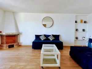 Ruang duduk di Villa vue imprenable sur l’Océan.
