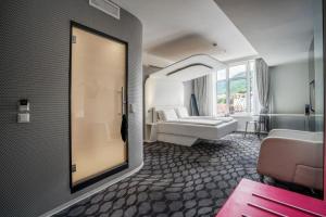 Postel nebo postele na pokoji v ubytování Magic Hotel & Apartments Kløverhuset