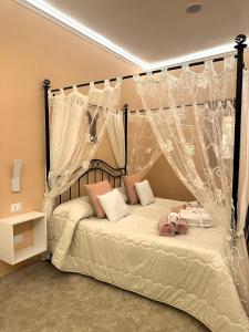 מיטה או מיטות בחדר ב-Agri Resort Masusa