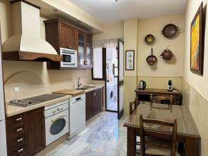 Kuchyň nebo kuchyňský kout v ubytování Apartamento Córdoba Patricia