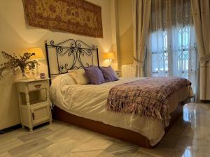Postel nebo postele na pokoji v ubytování Apartamento Córdoba Patricia