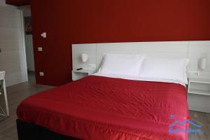 A bed or beds in a room at Quelli del vesuvio