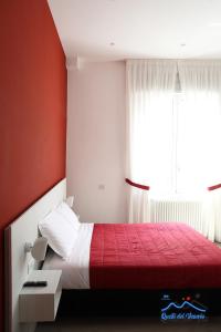 A bed or beds in a room at Quelli del vesuvio Még 37 kép